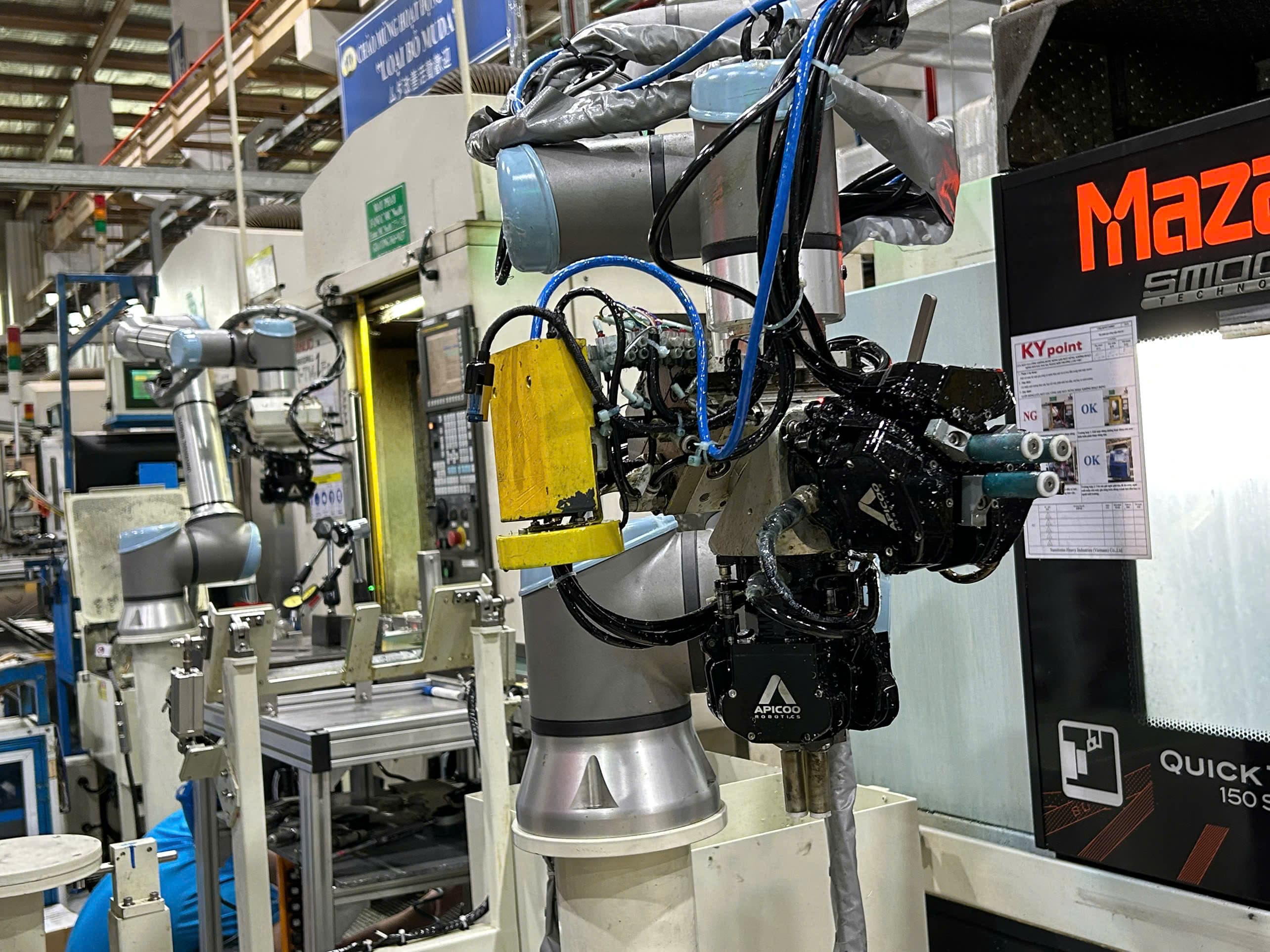 SusGrip-3F automating machine tending on a high-mix CNC production line